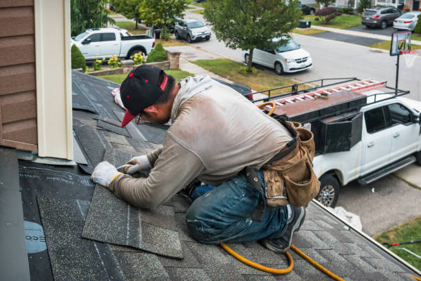 Professional Gutter Repair And Installation technician working in Parrish, FL